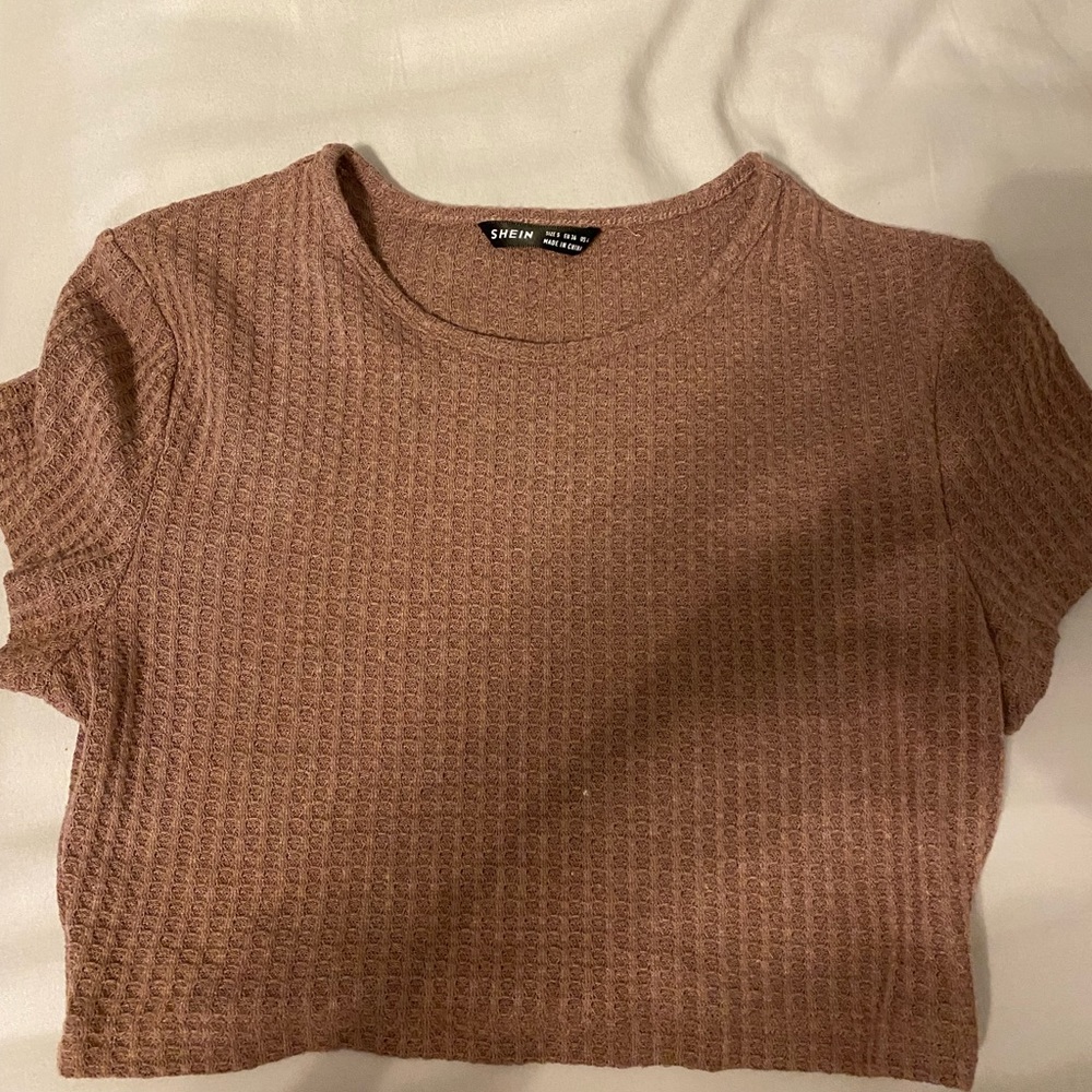 Crop top, never worn and perfect condition. Size small.